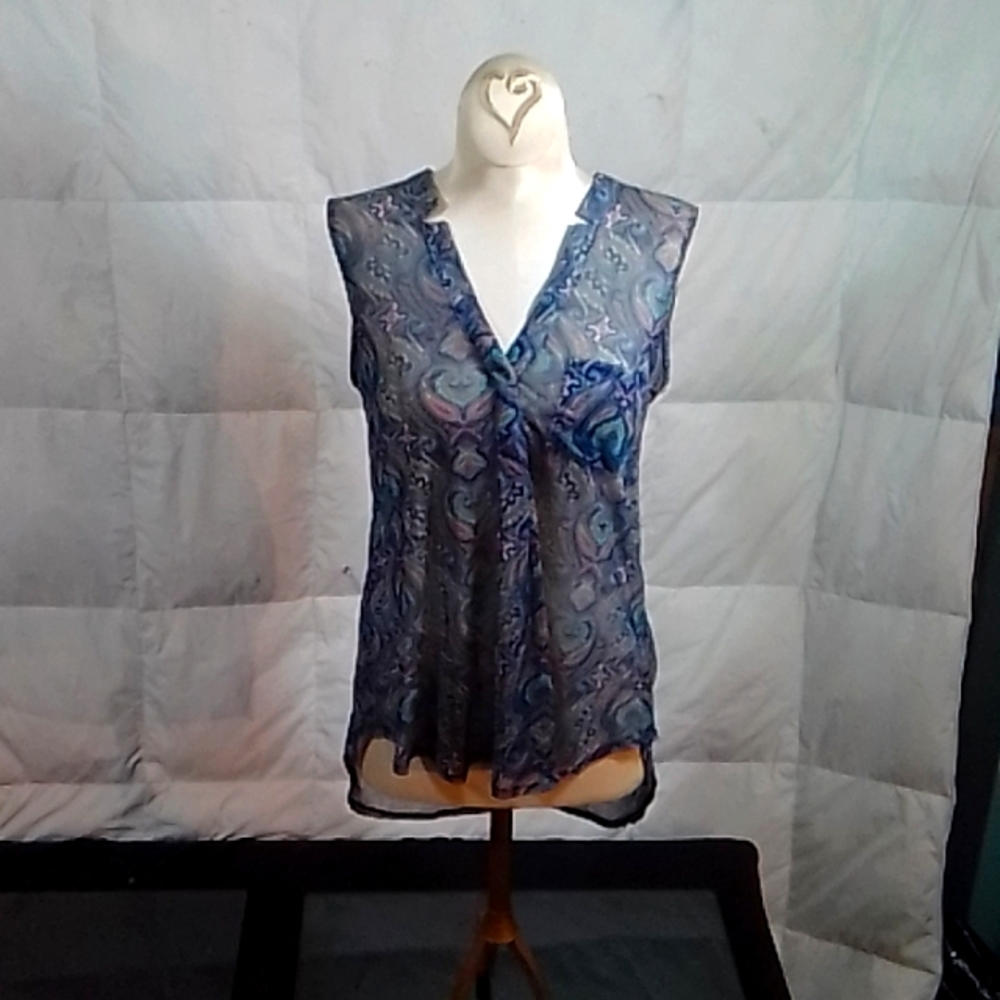 Sheer sleeveless blouse by Eden & Olivia